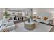 Expansive living space seamlessly connects to a modern kitchen, perfect for entertaining and everyday living at 706 Fireball Ct, Knightdale, NC 27545