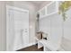 Organized mudroom offers built-in storage and a convenient bench, perfect for everyday use at 706 Fireball Ct, Knightdale, NC 27545