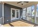 Spacious screened-in porch featuring wooden deck and easy access to the backyard at 706 Fireball Ct, Knightdale, NC 27545