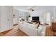 Bright living room with hardwood floors, neutral decor, and plenty of natural light at 829 Colleton Rd, Raleigh, NC 27610