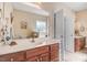 Bathroom vanity with lots of counter space and wood-stained cabinetry at 83 Wahoo Dr, Clayton, NC 27520