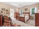 Bright bedroom with a ceiling fan, light-colored walls, and carpet at 83 Wahoo Dr, Clayton, NC 27520