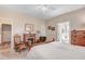 Bedroom featuring carpeted floors, traditional furniture, and an ensuite bathroom at 83 Wahoo Dr, Clayton, NC 27520