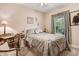Comfortable bedroom with a cozy bed, desk, and view of the green yard at 83 Wahoo Dr, Clayton, NC 27520