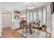 Inviting breakfast nook with decorative chairs, natural light, and a view to the living room at 83 Wahoo Dr, Clayton, NC 27520