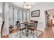Charming breakfast nook with a round table, decorative chairs, and bright natural light at 83 Wahoo Dr, Clayton, NC 27520