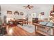 Bright living room with hardwood floors, comfortable seating, and stylish decor at 83 Wahoo Dr, Clayton, NC 27520