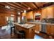 Well-equipped kitchen with stainless steel appliances, granite countertops, and a center island with seating at 932 Gynnis Creek Dr, Moncure, NC 27559