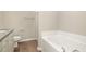 Bathroom featuring a tub and shower, a toilet, and a granite-topped vanity at 104 Burnello Ct, Princeton, NC 27569