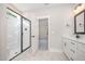 Bathroom with a glass enclosed shower and large mirror at 104 Roma Gora Ct, Princeton, NC 27569