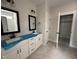 Bathroom featuring double sinks, tile floors, and modern fixtures at 104 Roma Gora Ct, Princeton, NC 27569