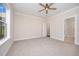 Spacious bedroom with neutral carpet and bright natural light at 104 Roma Gora Ct, Princeton, NC 27569