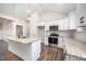 Kitchen featuring granite counters, stainless appliances, and white cabinetry at 104 Roma Gora Ct, Princeton, NC 27569