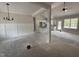 Bright open-concept living space flows into the kitchen with modern finishes at 104 Roma Gora Ct, Princeton, NC 27569
