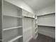 Organized walk-in closet with ample shelving offers plenty of storage space at 104 Roma Gora Ct, Princeton, NC 27569