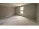 Unfinished bedroom with neutral walls, trim, and a window to allow natural light at 105 Tuskeegee Dr, Smithfield, NC 27577