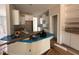 Spacious kitchen featuring white cabinets, an island, and ample counter space at 105 Tuskeegee Dr, Smithfield, NC 27577