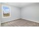 This well-lit bedroom is a versatile space with a view through a large window at 106 Burnello Ct, Princeton, NC 27569