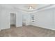 The main bedroom offers a walk-in closet and an ensuite bathroom with soaking tub at 106 Burnello Ct, Princeton, NC 27569