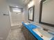New bathroom with double sink vanity, decorative mirrors, and shower with full tub at 106 Roma Gora Ct, Princeton, NC 27569