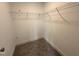 This closet features a clothes rack and neutral colored carpet with a white baseboard at 106 Roma Gora Ct, Princeton, NC 27569