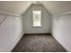 Well-lit closet featuring durable wire shelving for optimal storage and plush carpeting at 106 Roma Gora Ct, Princeton, NC 27569