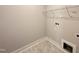 Functional laundry room with tile flooring and space for laundry machines at 106 Roma Gora Ct, Princeton, NC 27569