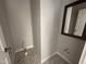 Small laundry room with geometric tile flooring and utility connections for convenience at 106 Roma Gora Ct, Princeton, NC 27569