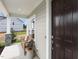 Charming front porch with a cozy bench and stylish decor at 108 E Fountainhead Ln, Garner, NC 27529