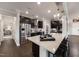 Well-equipped kitchen with a large island and stainless steel appliances at 108 E Fountainhead Ln, Garner, NC 27529