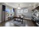 Bright office with dark wood floors, ample natural light, and stylish shelving at 108 E Fountainhead Ln, Garner, NC 27529