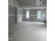 Spacious room with ample natural light, ready for transformation into your desired space at 1116 Kimberly Dr, Raleigh, NC 27609