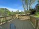 Spacious wooden deck overlooking scenic greenery at 112 Remington Woods Dr, Wake Forest, NC 27587