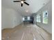 Open layout showcases the living room and kitchen area with a stylish island at 112 Remington Woods Dr, Wake Forest, NC 27587