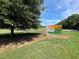 Entrance sign for E. Carroll Joyner Park with beautiful landscaping and a picturesque setting at 112 Remington Woods Dr, Wake Forest, NC 27587
