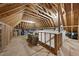 Unfinished attic space with exposed beams, subflooring, and plenty of room for future expansion or storage at 113 Woodland Ridge Ct, Cary, NC 27519