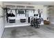 Organized garage with slat wall, storage solutions, bikes, sports equipment and tools at 113 Woodland Ridge Ct, Cary, NC 27519