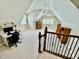 Upstairs bonus area provides additional workspace and room for relaxation at 113 Woodland Ridge Ct, Cary, NC 27519