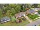 Aerial view of home featuring mature trees and landscaping at 1205 Country Ridge Dr, Raleigh, NC 27609