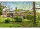 Spacious backyard featuring a deck and screened porch at 1205 Country Ridge Dr, Raleigh, NC 27609