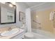 Bathroom with a vanity, toilet, tub and shower combination at 1205 Country Ridge Dr, Raleigh, NC 27609