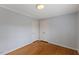 Bright bedroom with hardwood floors and closet space at 1205 Country Ridge Dr, Raleigh, NC 27609
