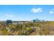 Urban skyline peeks through the trees, offering a glimpse of the bustling city life just beyond the neighborhood at 1205 Country Ridge Dr, Raleigh, NC 27609