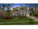 Charming two-story home featuring well-maintained landscaping and a welcoming front porch at 1205 Country Ridge Dr, Raleigh, NC 27609