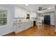 Beautiful kitchen with white cabinets, modern appliances, and sleek countertops at 1205 Country Ridge Dr, Raleigh, NC 27609