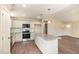 This kitchen features stainless steel appliances, granite countertops, and a kitchen island at 122 Wilderness Trl, Smithfield, NC 27577