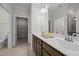 Modern bathroom with double vanity, stylish fixtures, and separate toilet area at 1241 White Flint Cir, Durham, NC 27703