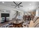 Inviting living space with hardwood floors, neutral tones, and staircase access at 1241 White Flint Cir, Durham, NC 27703