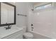 Well-lit bathroom with a tub/shower combination and modern vanity with sink and mirror at 125 Prosecco Dr, Princeton, NC 27569