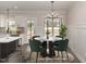 Dining area is staged with a round table, chairs, and decorative lighting fixture at 125 Prosecco Dr, Princeton, NC 27569